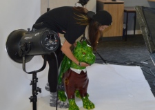 City College Norwich students are the official photographers for the GoGoDragons! Schools Project.<br /><br /><br />
Student Rosa Hughes carefully positioning one of the baby dragons ready for the photo shoot.
