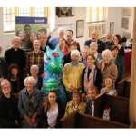 Gloria with Community group